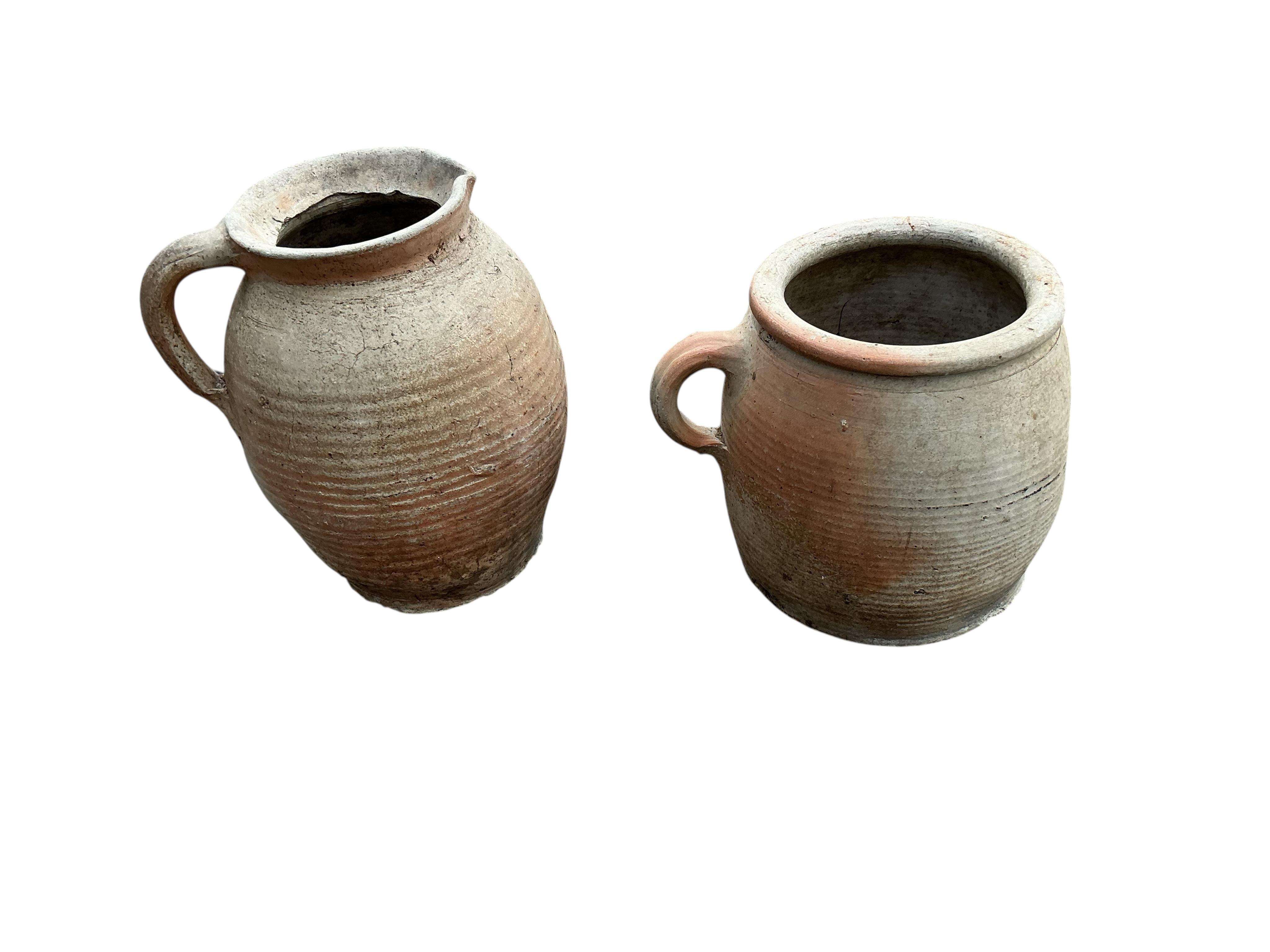 Eight assorted earthenware vessels, largest height 40cm